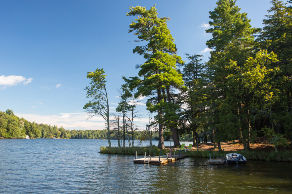 Northern Wisconsin lake with boat and pier